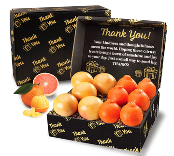 Box of citrus fruits with 'Thank You!' message on a white background