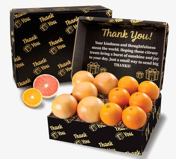 Fruit gift box with oranges and grapefruits, featuring 'Thank You!' text on a white background.